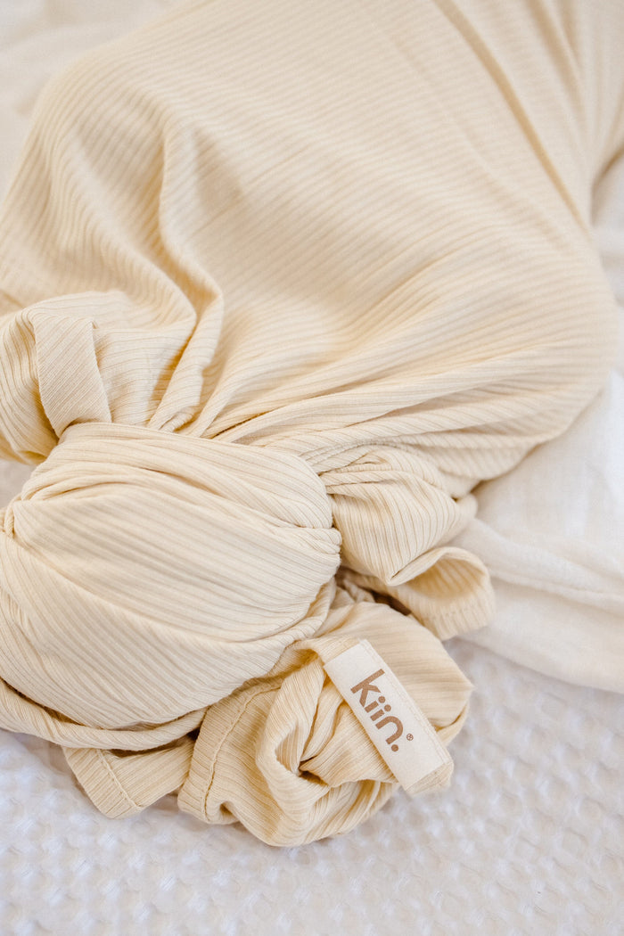 Close up of Oat bamboo stretch swaddle fabric