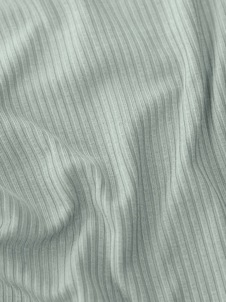 Close-up of Sage Kiin bamboo rib fabric, showing the ribbed texture