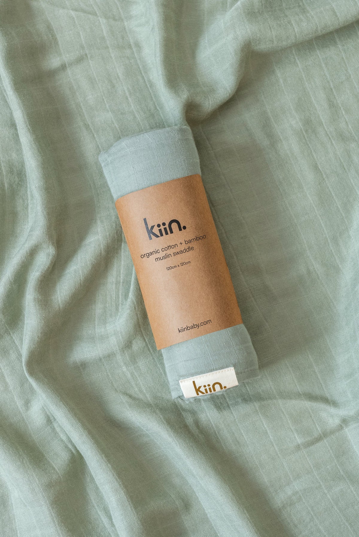 Organic muslin baby swaddle in sage greensoft newborn essential and baby shower gift. Breathable organic cotton bamboo swaddle for hospital bags and newborn sleep.